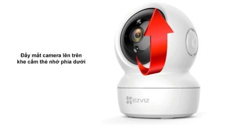 Nút reset nằm cạnh khe cắm thẻ nhớ, đẩy mắt camera ngược lên trời